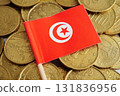 Tunisia flag on coin and banknote money, finance trading investment business currency concept. 131836956