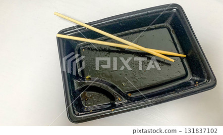 Container waste after eating a convenience store bento 131837102