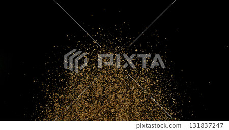 Powerful burst of clay particles exploding upward in a dense cloud, isolated on black. High-speed photography capturing the dynamic texture of dry earth in motion. 131837247