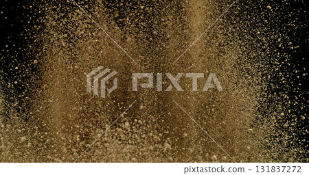 Powerful burst of clay particles exploding upward in a dense cloud, isolated on black. High-speed photography capturing the dynamic texture of dry earth in motion. 131837272