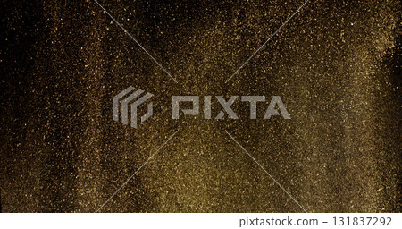 Detailed wave of airborne clay dust swirling in chaotic motion, captured in freeze  motion. Dramatic natural explosion of earthy particles on black background. 131837292