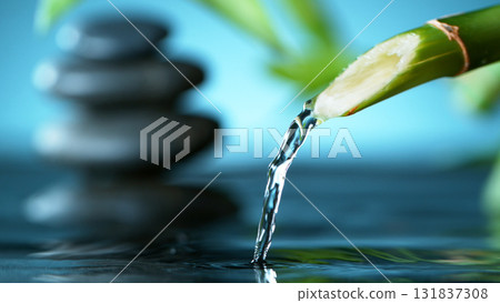 Zen Stones. Bamboo Water Fountain in Spa Garden Zen Stones. Bamboo Water Fountain in Spa Garden 131837308