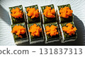 Tobiko Sushi Rolls Served on Ceramic Plate 131837313
