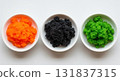 Colorful Fish Roe in Three Small Bowls 131837315