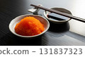 Tobiko Fish Roe with Soy Sauce on Dark Table 131837323