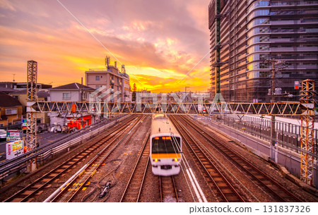 Tokyo's main commuter line, the Chuo Line, at dusk 131837326