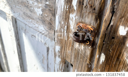 Antique wooden door with a lock 131837458