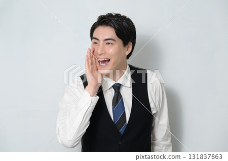 A man calling out on a white background 131837863