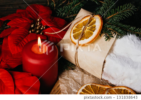 Christmas stollen on wooden background. Traditional christmas german dessert cut into pieces. Cake with nuts, raisins with marzipan and dried fruit on cutting board. baking for xmas 131838643