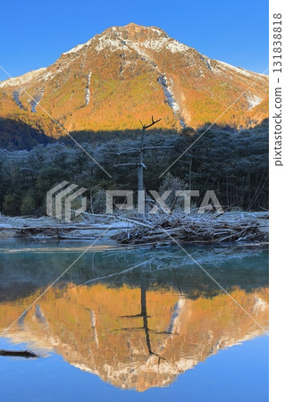 Taisho pond in Kamikochi and Yakedake Taisho pond in Kamikochi and Yakedake 131838818