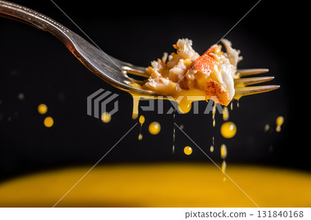 Crab Meat on Fork Dripping Rich Yellow Sauce 131840168