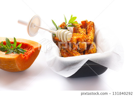 Rustic baked pumpkin with caramelized honey and sesame topping Rustic baked pumpkin with caramelized honey and sesame topping 131840292