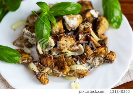 Homemade roasted eggplant salad with onion and herb dressing Homemade roasted eggplant salad with onion and herb dressing 131840293