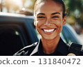 A female police officer with a warm smile interacts with residents in a friendly manner. She is on duty in a peaceful neighborhood on a bright day, promoting community relations 131840472