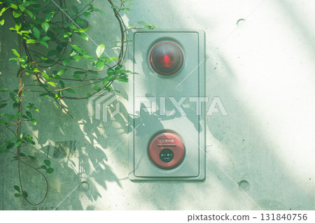 Emergency button on a white wall 131840756