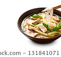 Vietnamese pho beef noodle soup with chopsticks lifting noodles 131841071
