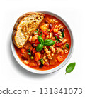 Minestrone soup serving bowl with fresh basil and toast 131841073