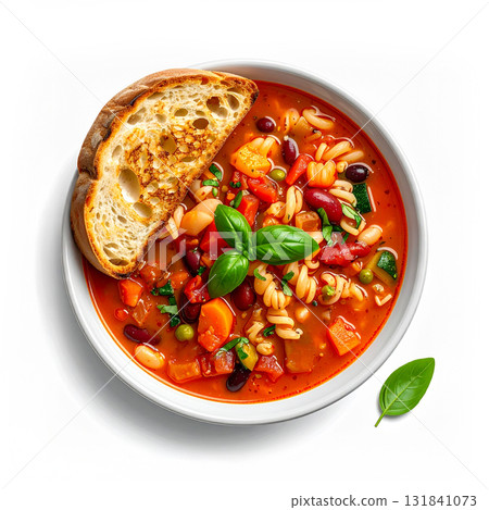 Minestrone soup serving bowl with fresh basil and toast 131841073