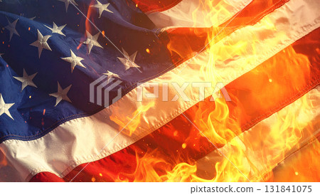 American flag burning in fire representing national crisis American flag burning in fire representing national crisis 131841075