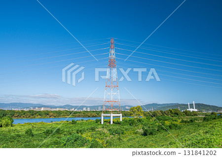 Power line tower standing on the Yodo River riverbed, Hirakata City Power line tower standing on the Yodo River riverbed, Hirakata City 131841202