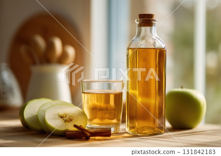 Fermented apple cider drink in a glass and bottle Fermented apple cider drink in a glass and bottle 131842183