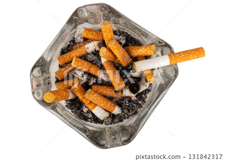 Glass Ashtray with Extinguished Cigarette Inside on White Background Glass Ashtray with Extinguished Cigarette Inside on White Background 131842317
