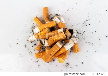 Pile of Cigarette Butts on White Background Pile of Cigarette Butts on White Background 131842328