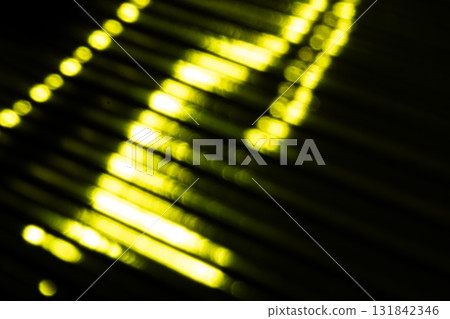 Yellow-green metallic sparkling background material 131842346