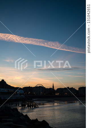 Resort hotels lined up along Concha Beach in San Sebastian and the street lights in the morning glow 131842651