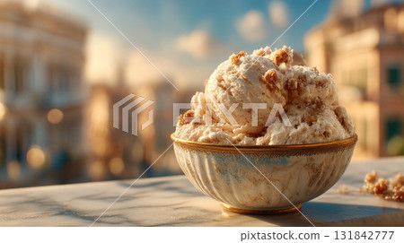 Delightful Dessert. A bowl of creamy ice cream with crumbly toppings 131842777