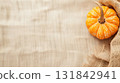 Minimal rustic fall background with pumpkins and fabric for Halloween, thanksgiving, fall designs. 131842941