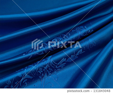 A gorgeous blue silk drape with blue embroidery. A gorgeous blue silk drape with blue embroidery. 131843048
