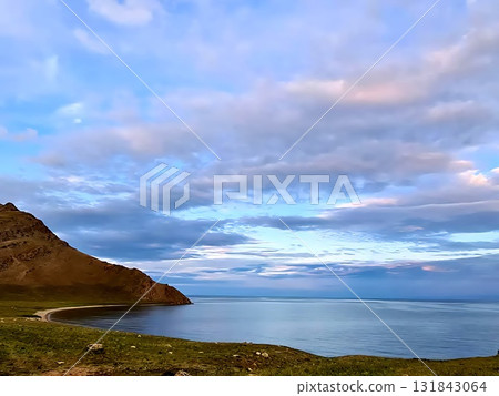 Pastel Clouds Above Curved Baikal Shore At Twilight 131843064