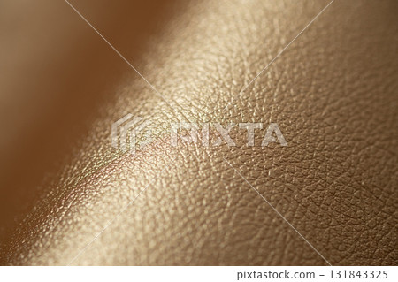 Gold-colored leather image 131843325