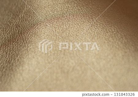 Gold-colored leather image Gold-colored leather image 131843326