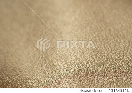 Gold-colored leather image 131843328