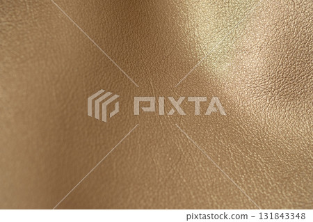 Gold-colored leather image Gold-colored leather image 131843348