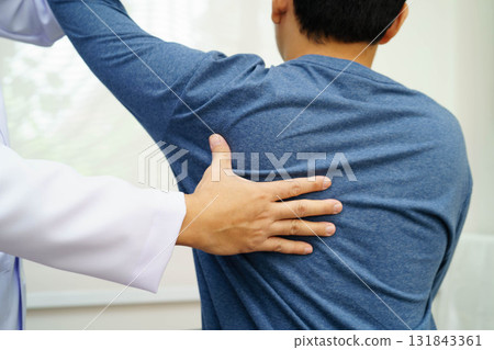 Physical therapy, Asian therapist doctor treat perform pain therapy in hospital. Physical therapy, Asian therapist doctor treat perform pain therapy in hospital. 131843361