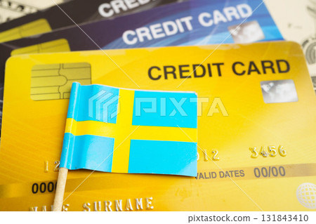Sweden Arabia flag on credit card, finance economy trading shopping online business. Sweden Arabia flag on credit card, finance economy trading shopping online business. 131843410
