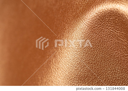 Orange metallic leather material image 131844008