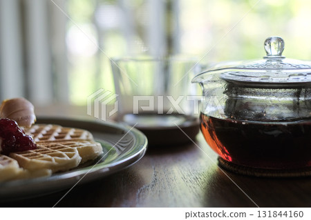 Delicious pancakes and tea Delicious pancakes and tea 131844160