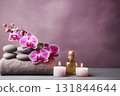 Beautiful spa composition. Couple Towels With Candles And Orchid For Natural Massage 131844644
