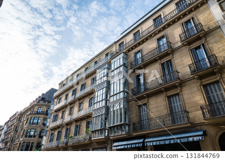 Historic buildings under the clear sky and morning glow in San Sebastian, Spain Historic buildings under the clear sky and morning glow in San Sebastian, Spain 131844769