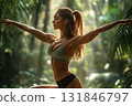 A muscular woman performing a challenging yoga pose outdoors, showcasing perfect balance and alignment, her toned arms and legs radiating strength and serenity, surrounded by lush greenery and soft 131846797