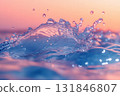 Pink ink swirls underwater in light blue water, creating a vibrant abstract background with smooth blending and dynamic motion 131846807