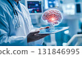 Doctor holding tablet with human brain model. 131846995