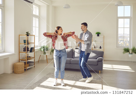 Joyful Family Dancing in the Living Room Joyful Family Dancing in the Living Room 131847252