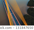 Symmetric modern cable-stayed bridge over rive, Contemporary urban span connecting city across waterway 131847650