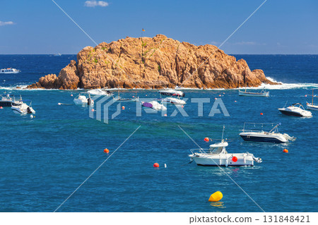 Rocky islet in Tossa de Mar, Spain Rocky islet in Tossa de Mar, Spain 131848421
