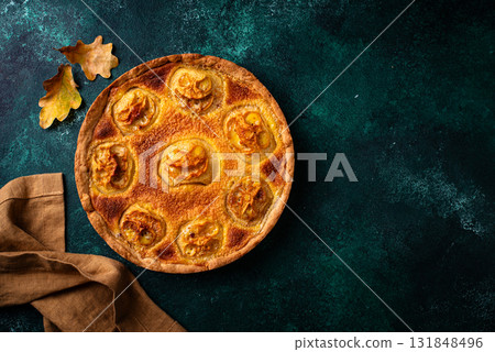 Halloween apple pie with scary faces 131848496